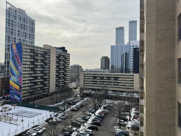 a view of a city with tall buildings