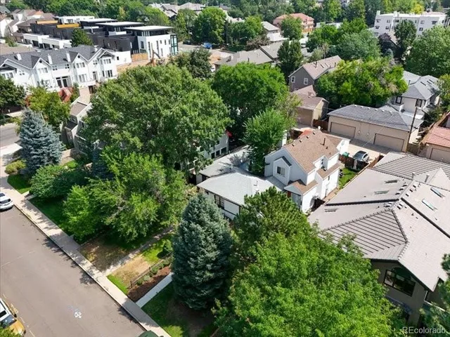 an aerial view of residential house with outdoor space and street view