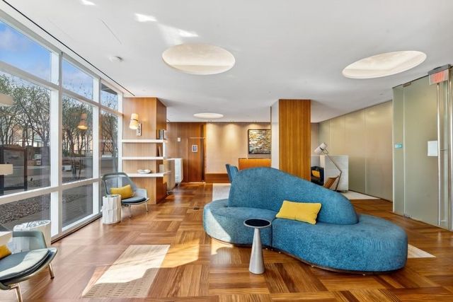 a living room with furniture and a table