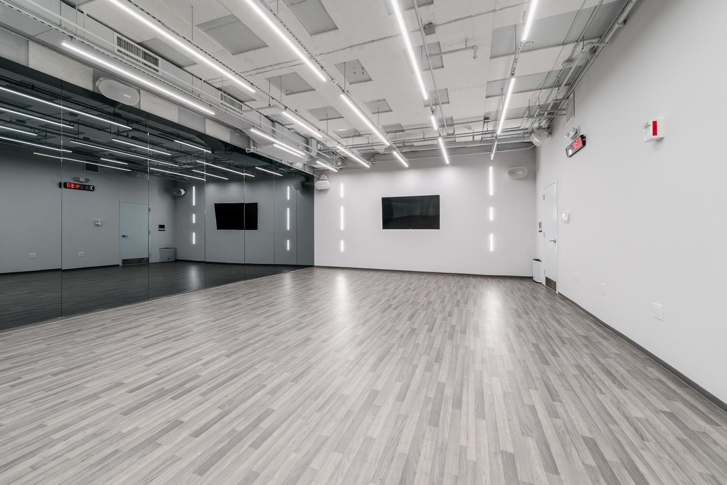 77 Hudson Street, Unit PH 4505 Jersey City, NJ 07302 - Photo 30 of 37 a view of a room with wooden floors