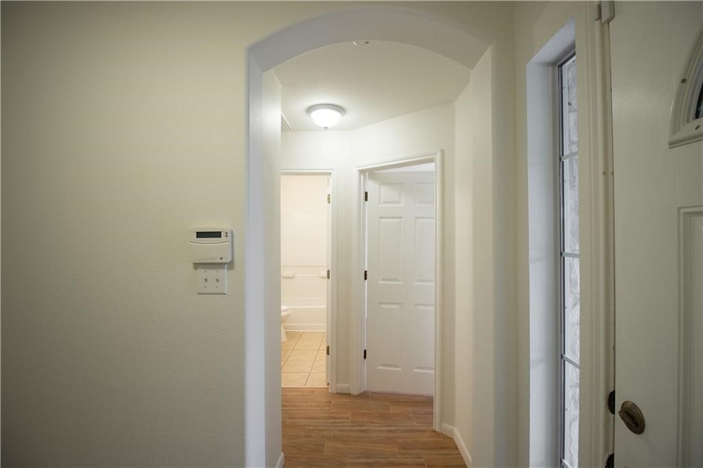 107 Thompson Trail Bastrop, TX 78602 - Photo 12 of 23 Hallway to guest bedrooms