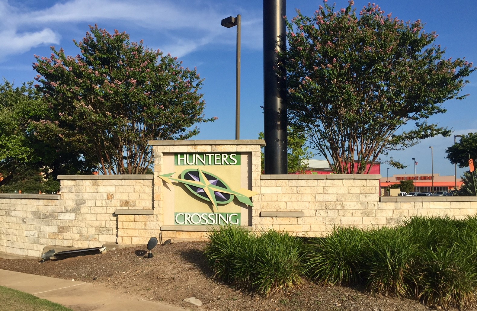 107 Thompson Trail Bastrop, TX 78602 - Photo 18 of 23 Hunter's Crossing subdivision sign