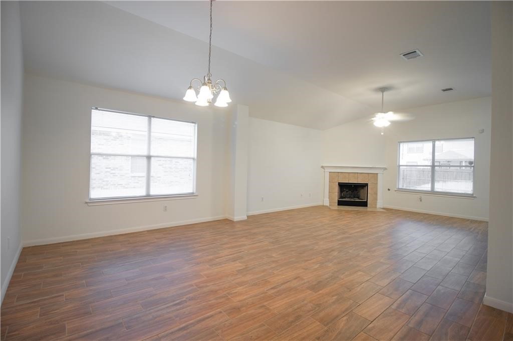 107 Thompson Trail Bastrop, TX 78602 - Photo 6 of 23 Living room and fireplace