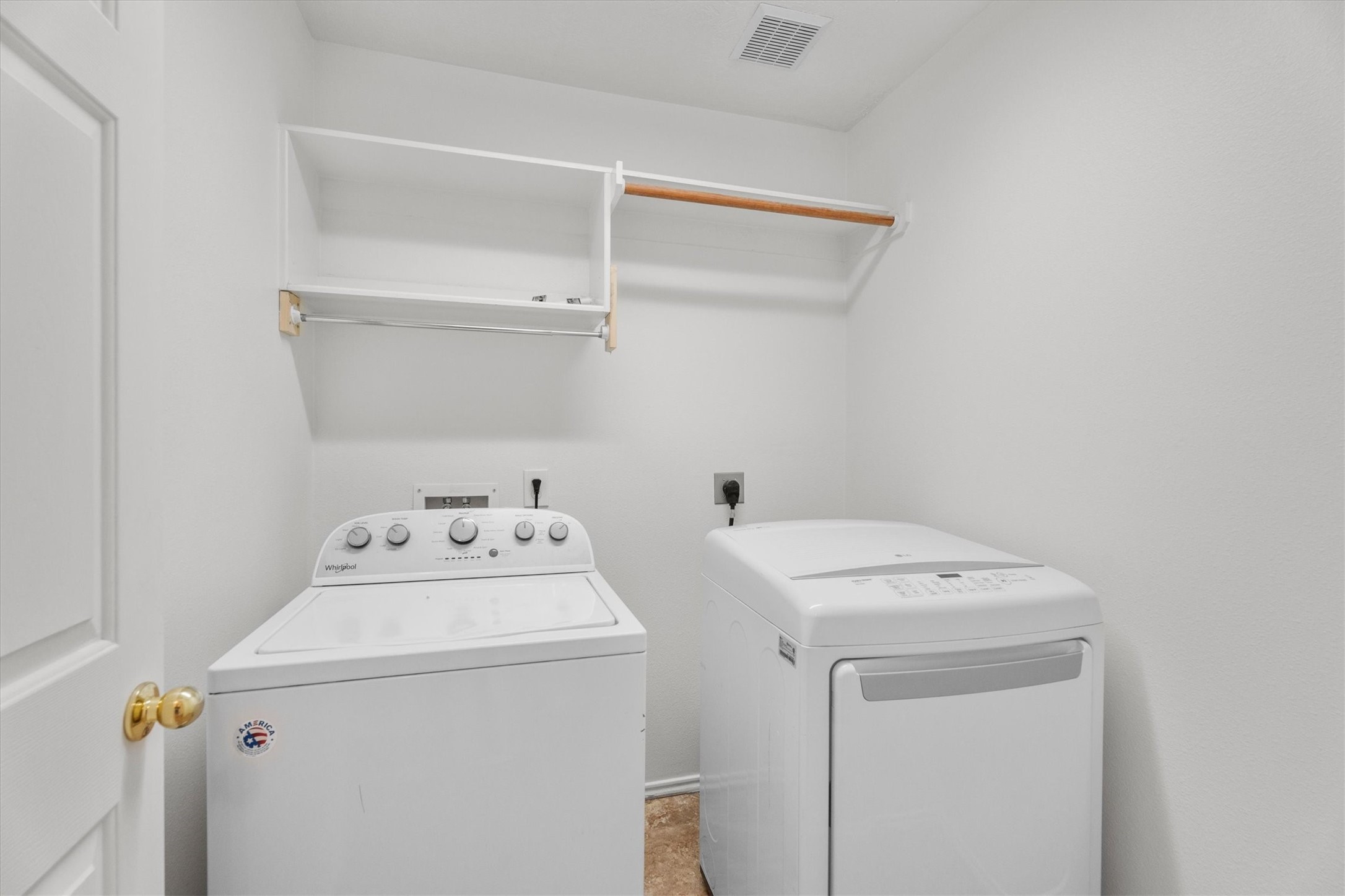 2507 Grayfeather Court Spring, TX 77388 - Photo 26 of 37 Laundry room with ample space for a full size washer and dryer, extra storage and hanging space above.