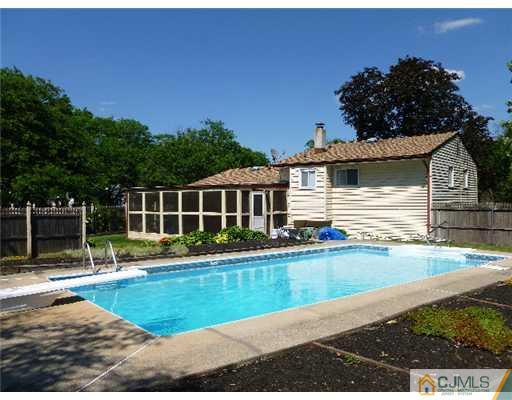 2 MacAfee Road Somerset, NJ 08873 - Photo 8 of 25 a house view with a swimming pool