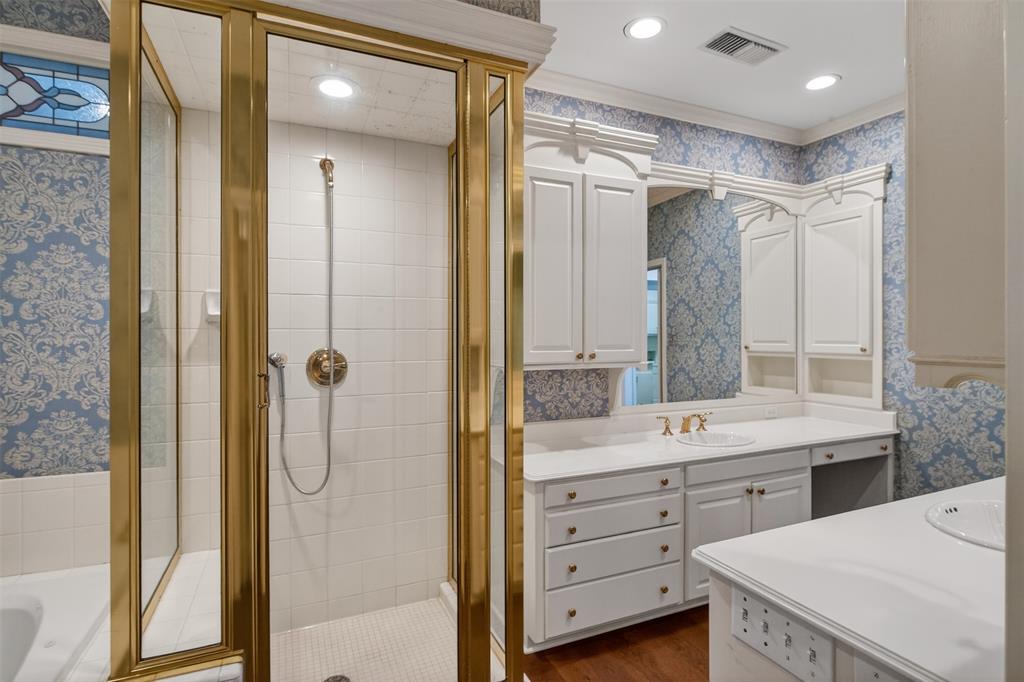 522 Rives Place Shreveport, LA 71106 - Photo 25 of 40 a bathroom with a double vanity sink mirror and shower