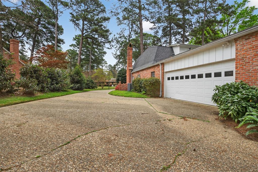 522 Rives Place Shreveport, LA 71106 - Photo 40 of 40 a view of a house with a yard and garage