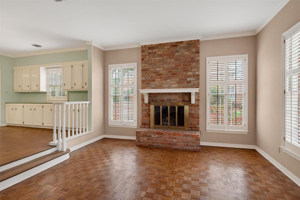 522 Rives Place Shreveport, LA 71106 - Photo 5 of 40 a view of an empty room with a fireplace and a window
