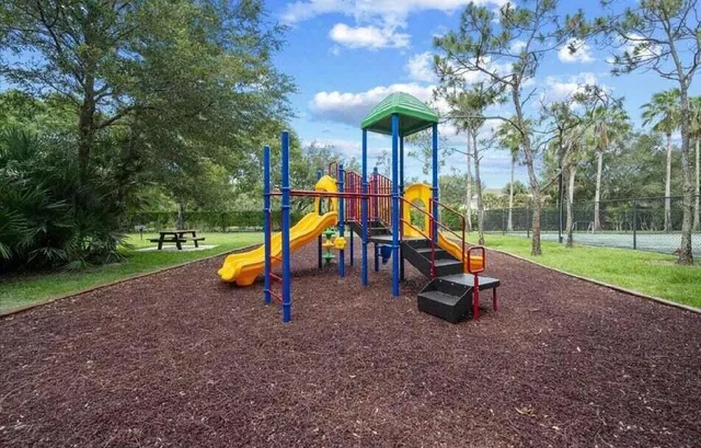 a view of a park with slide