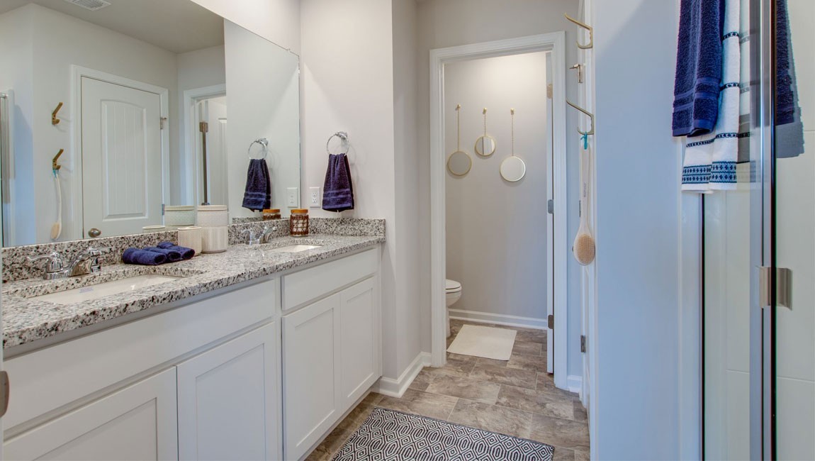 107 Grayson Circle Union City, TN 38261 - Photo 12 of 25 a bathroom with a sink and a mirror