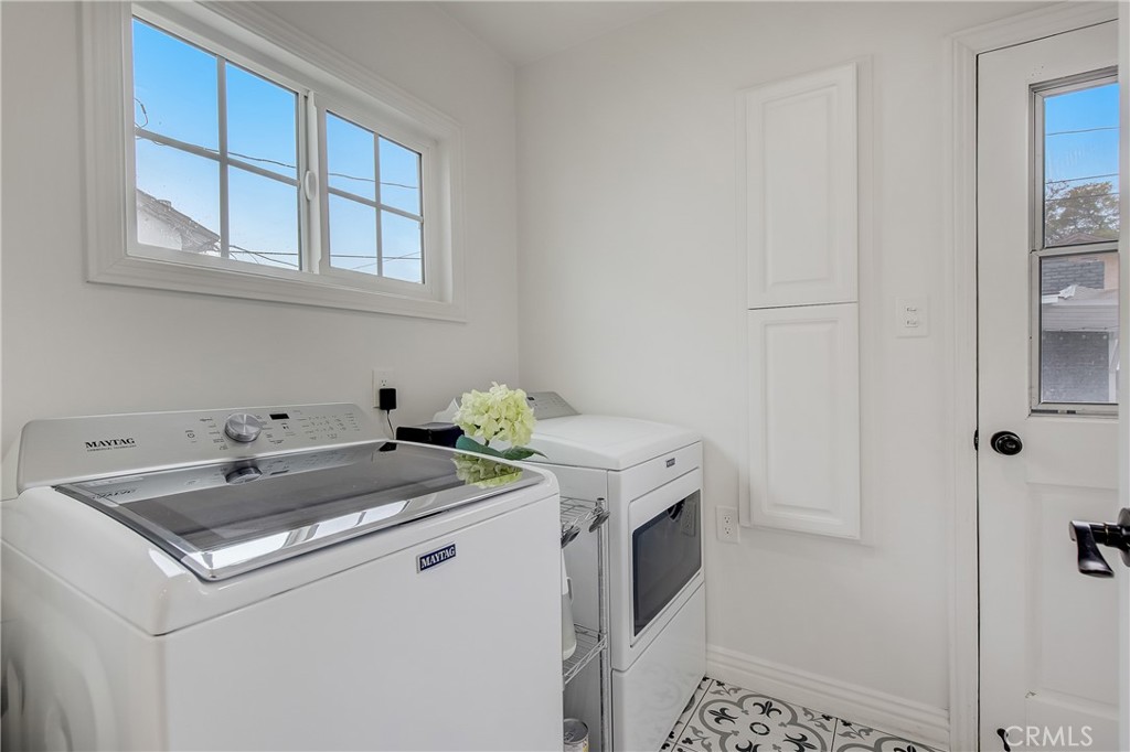 3743 North Studebaker Road Long Beach, CA 90808 - Photo 12 of 32 a utility room with dryer and washer