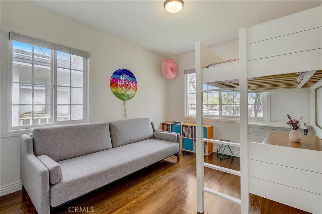 3743 North Studebaker Road Long Beach, CA 90808 - Photo 13 of 32 a living room with furniture and a large window