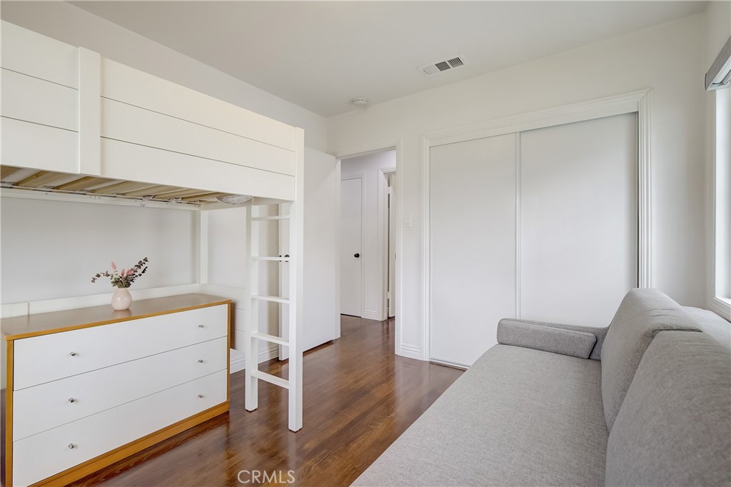 3743 North Studebaker Road Long Beach, CA 90808 - Photo 14 of 32 a room with furniture and wooden floor