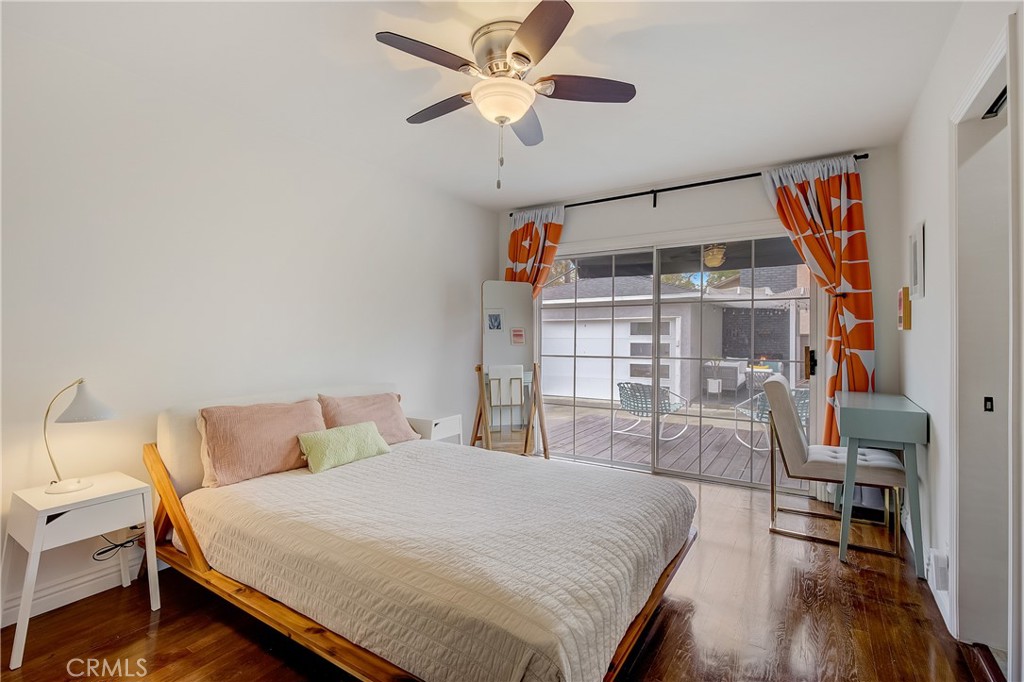 3743 North Studebaker Road Long Beach, CA 90808 - Photo 18 of 32 a bedroom with a bed and a table in it