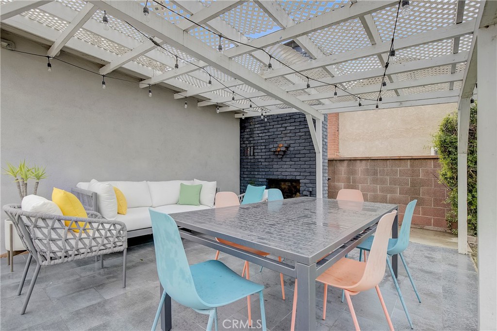 3743 North Studebaker Road Long Beach, CA 90808 - Photo 23 of 32 a outdoor space with a table and chairs