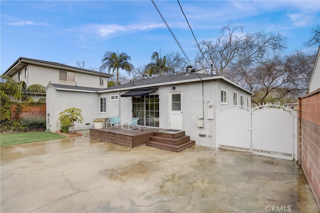 3743 North Studebaker Road Long Beach, CA 90808 - Photo 29 of 32 a view of a house with backyard and sitting area