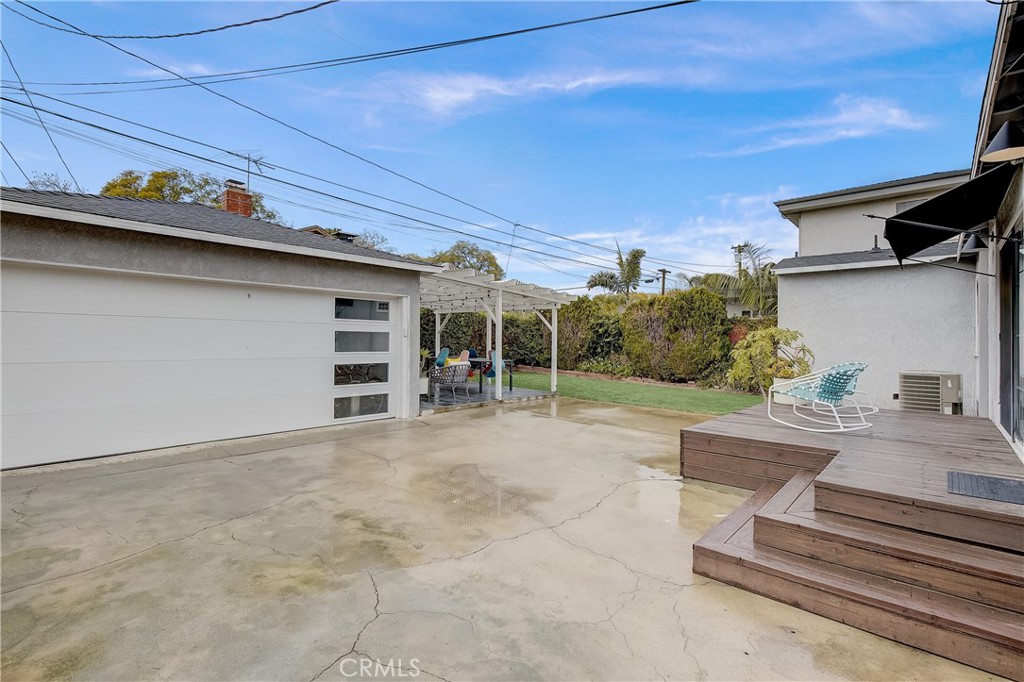 3743 North Studebaker Road Long Beach, CA 90808 - Photo 30 of 32 a view of a porch