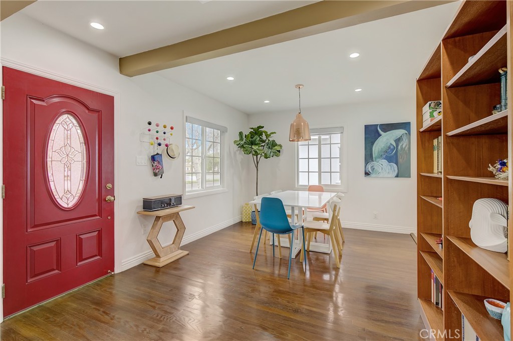 3743 North Studebaker Road Long Beach, CA 90808 - Photo 3 of 32 a view of a dining room with furniture window and wooden floor