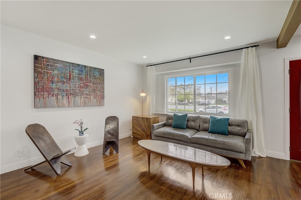 3743 North Studebaker Road Long Beach, CA 90808 - Photo 6 of 32 a living room with furniture and a window