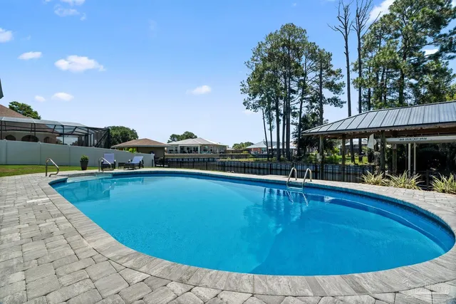 a living room with furniture a rug and a fireplace