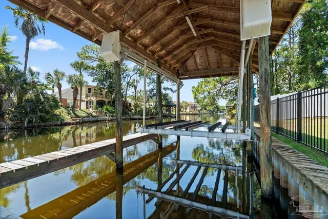 a view of a dining room with furniture and window