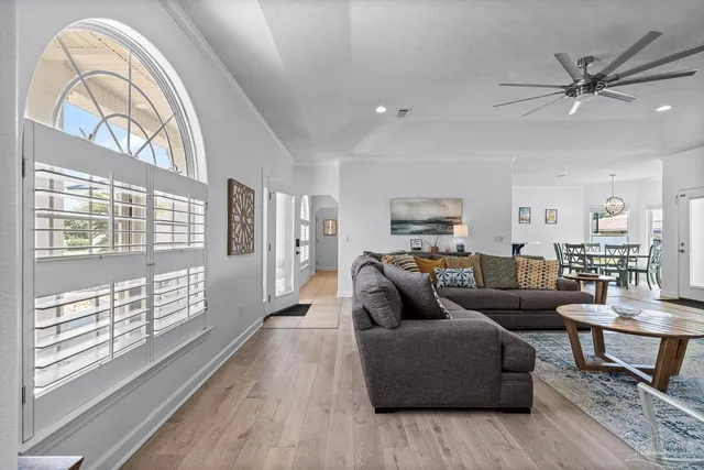 a large bathroom with a granite countertop double vanity sink and a mirror