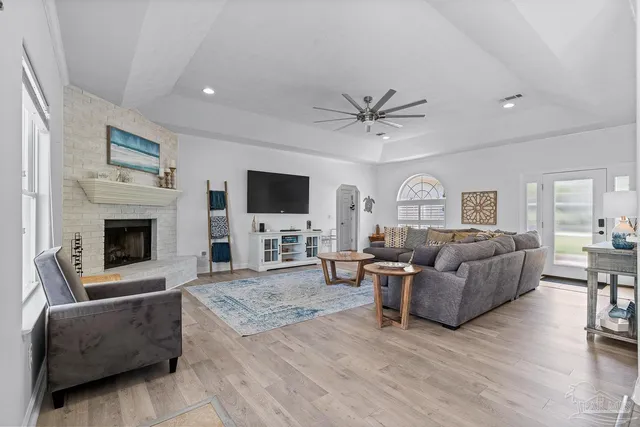 a living room with furniture and a rug