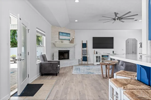 a spacious bedroom with a bed and a table in it