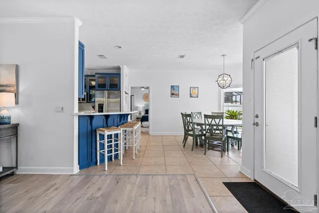 a bathroom with double vanity sinks and a mirror