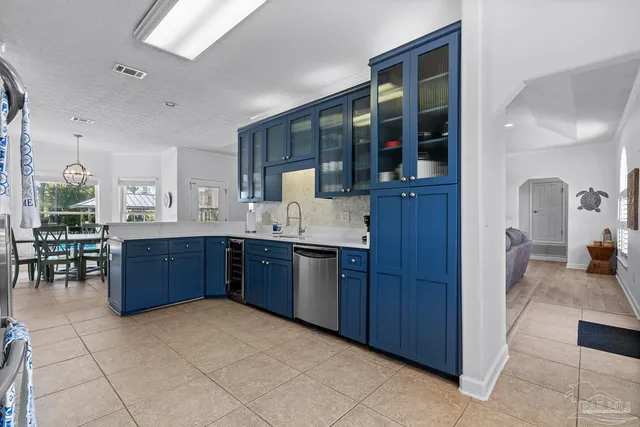a bathroom with a mirror sink and a mirror