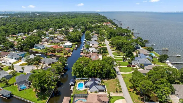 an aerial view of a house with a garden
