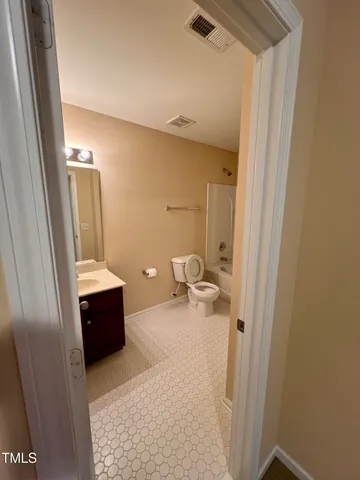 a view of a livingroom with a staircase