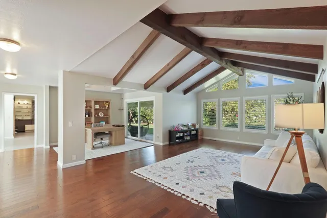 a large living room with a large window