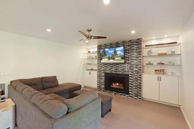 a bathroom with a sink a mirror and a toilet