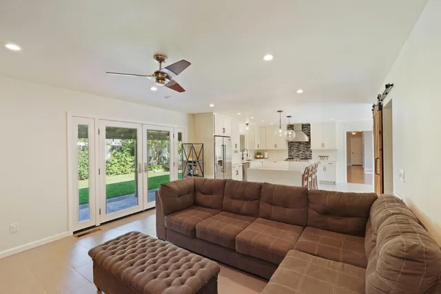 a kitchen with sink stove and cabinets