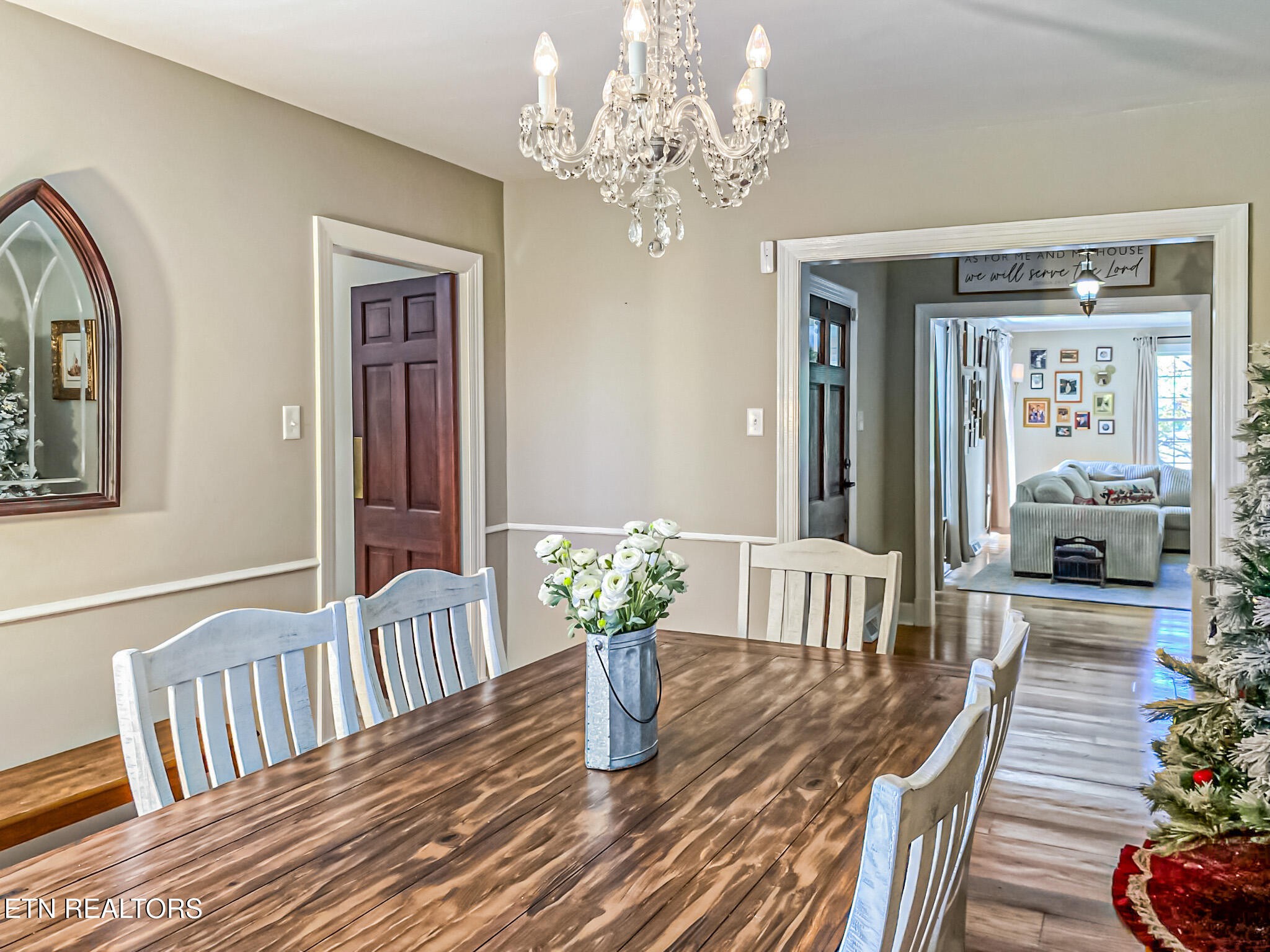 351 Country Club Road La Follette, TN 37766 - Photo 14 of 60 a dining room with furniture a chandelier and wooden floor