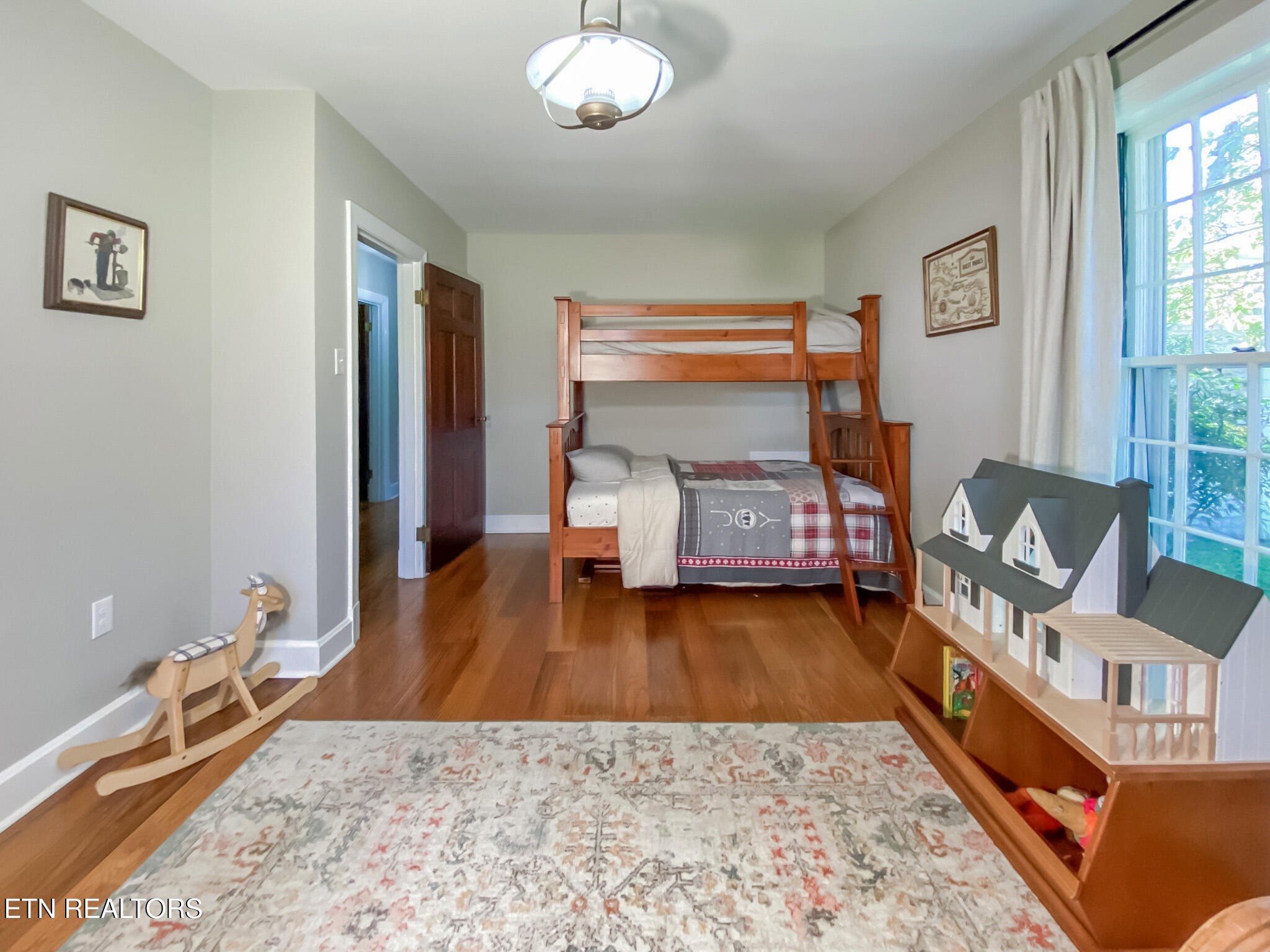 351 Country Club Road La Follette, TN 37766 - Photo 27 of 60 a living room with furniture and a wooden floor