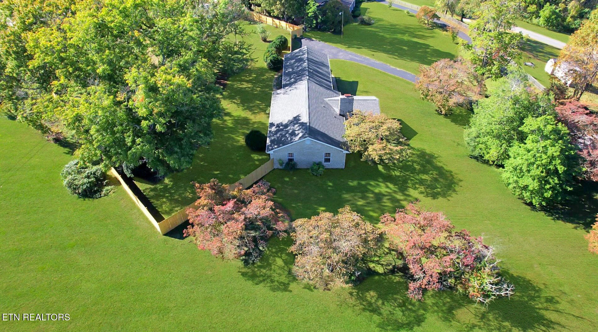 351 Country Club Road La Follette, TN 37766 - Photo 49 of 60 an aerial view of a house with a garden
