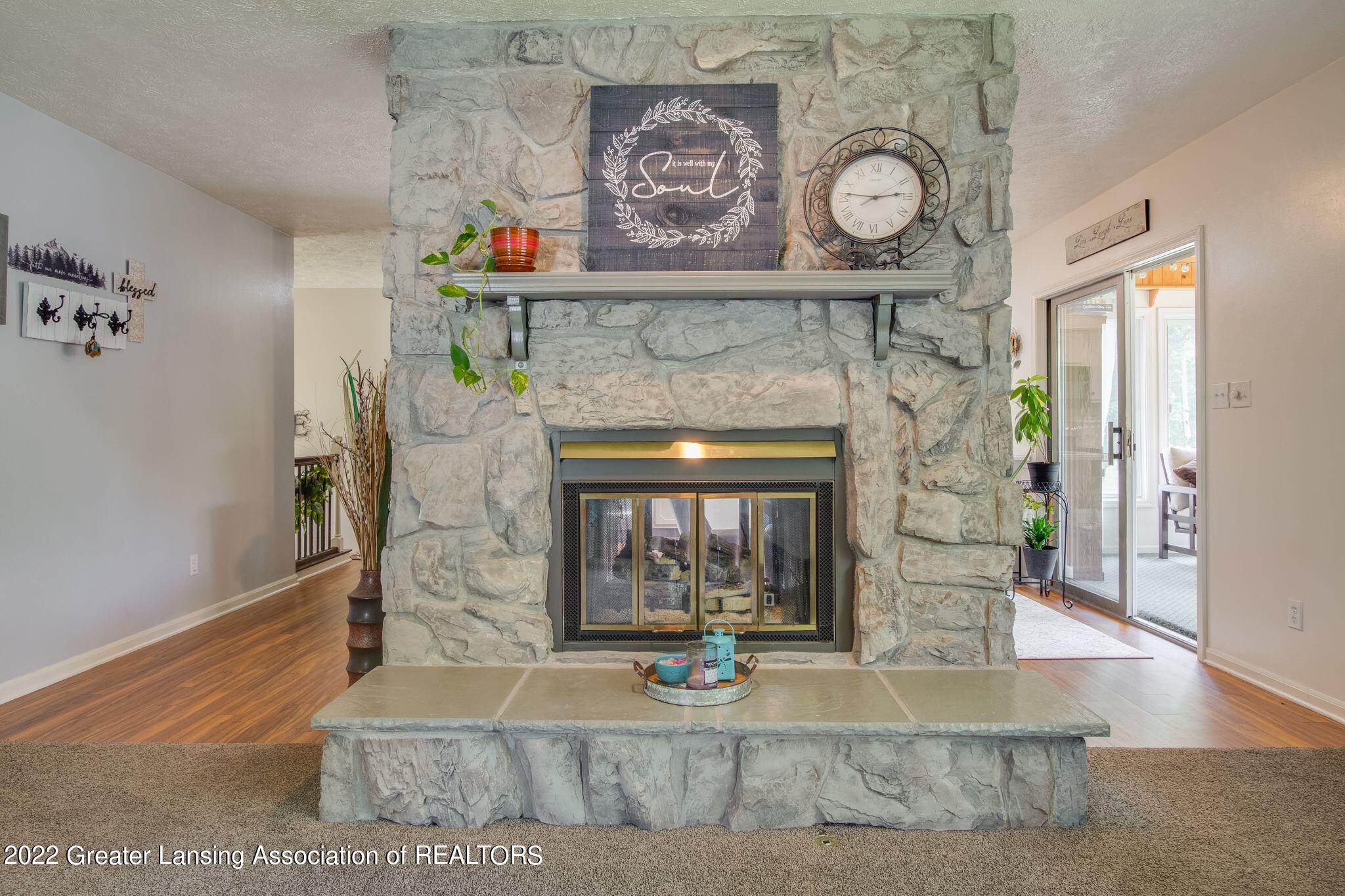 1208 Schavey Road Dewitt, MI 48820 - Photo 18 of 38 Stone Fireplace