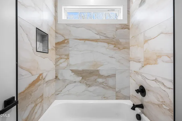 a bathroom with a bathtub
