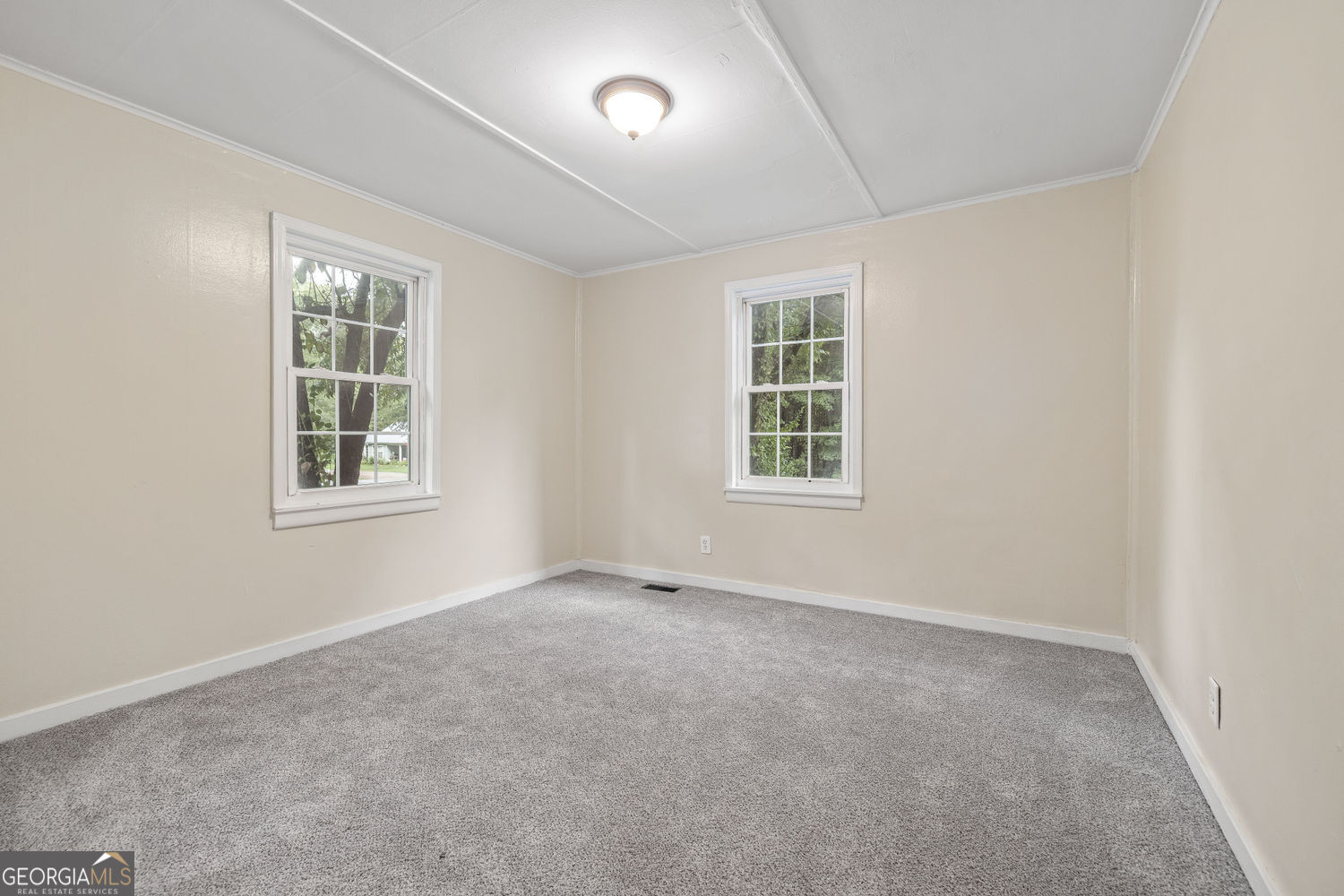 610 Level Grove Road Cornelia, GA 30531 - Photo 14 of 24 an empty room with windows