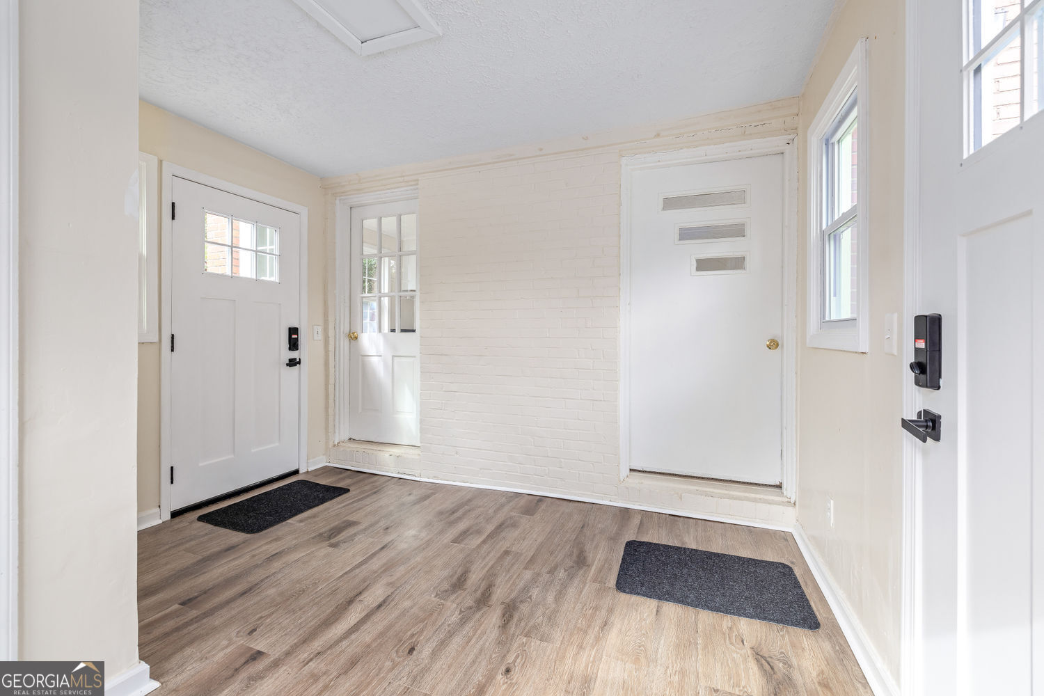 610 Level Grove Road Cornelia, GA 30531 - Photo 2 of 24 wooden floor in an empty room with a window