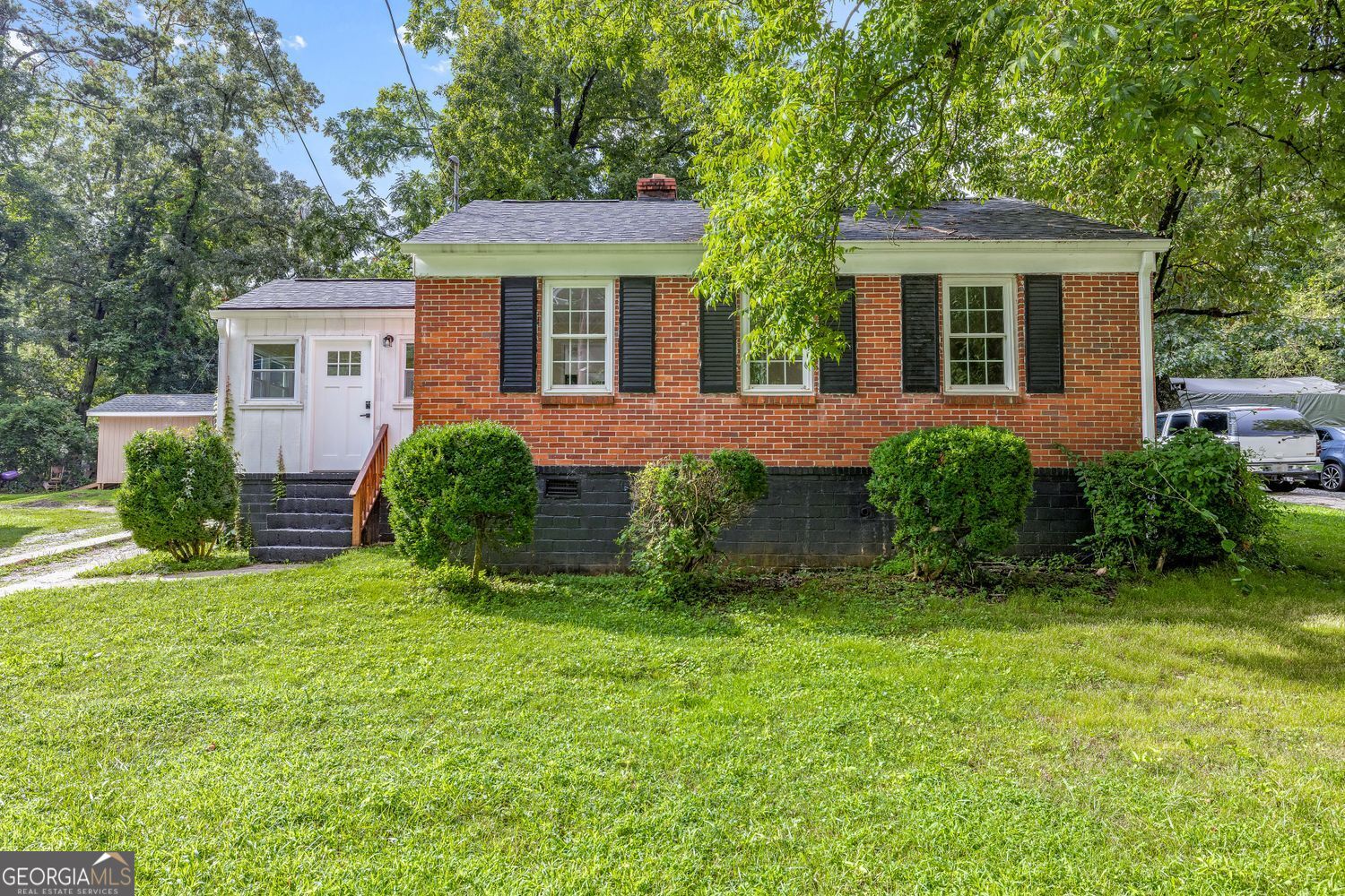 610 Level Grove Road Cornelia, GA 30531 - Photo 22 of 24 a view of a house with a yard and plants