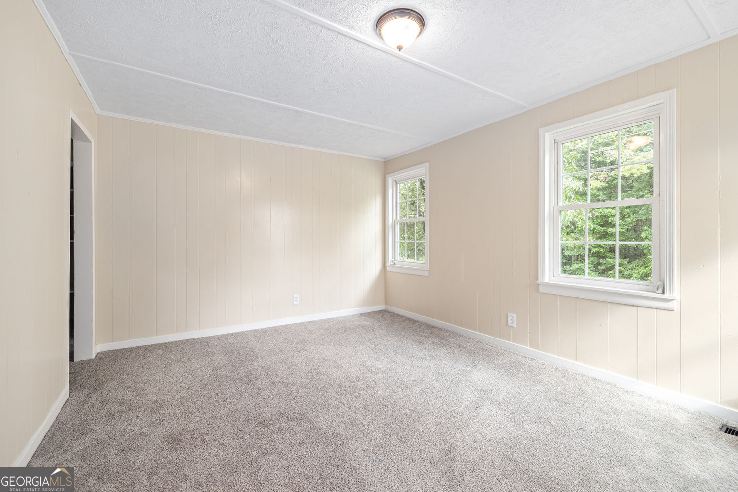 610 Level Grove Road Cornelia, GA 30531 - Photo 8 of 24 an empty room with windows