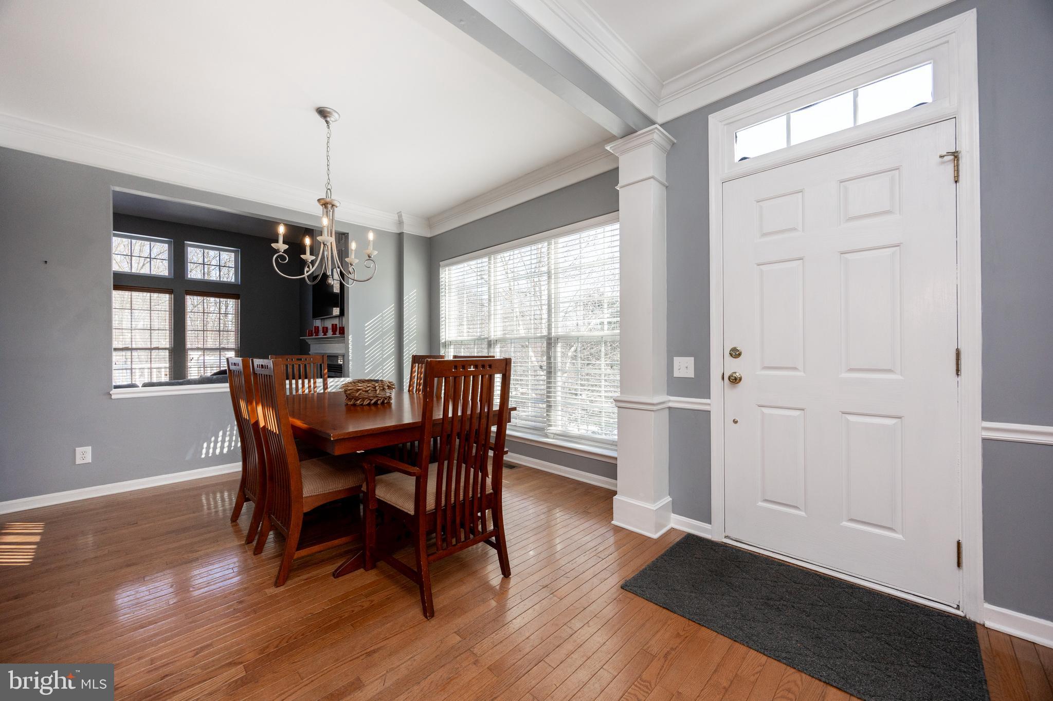 612 Churchill Road Chester Springs, PA 19425 - Photo 11 of 33 a view of a dining room with furniture window and wooden floor