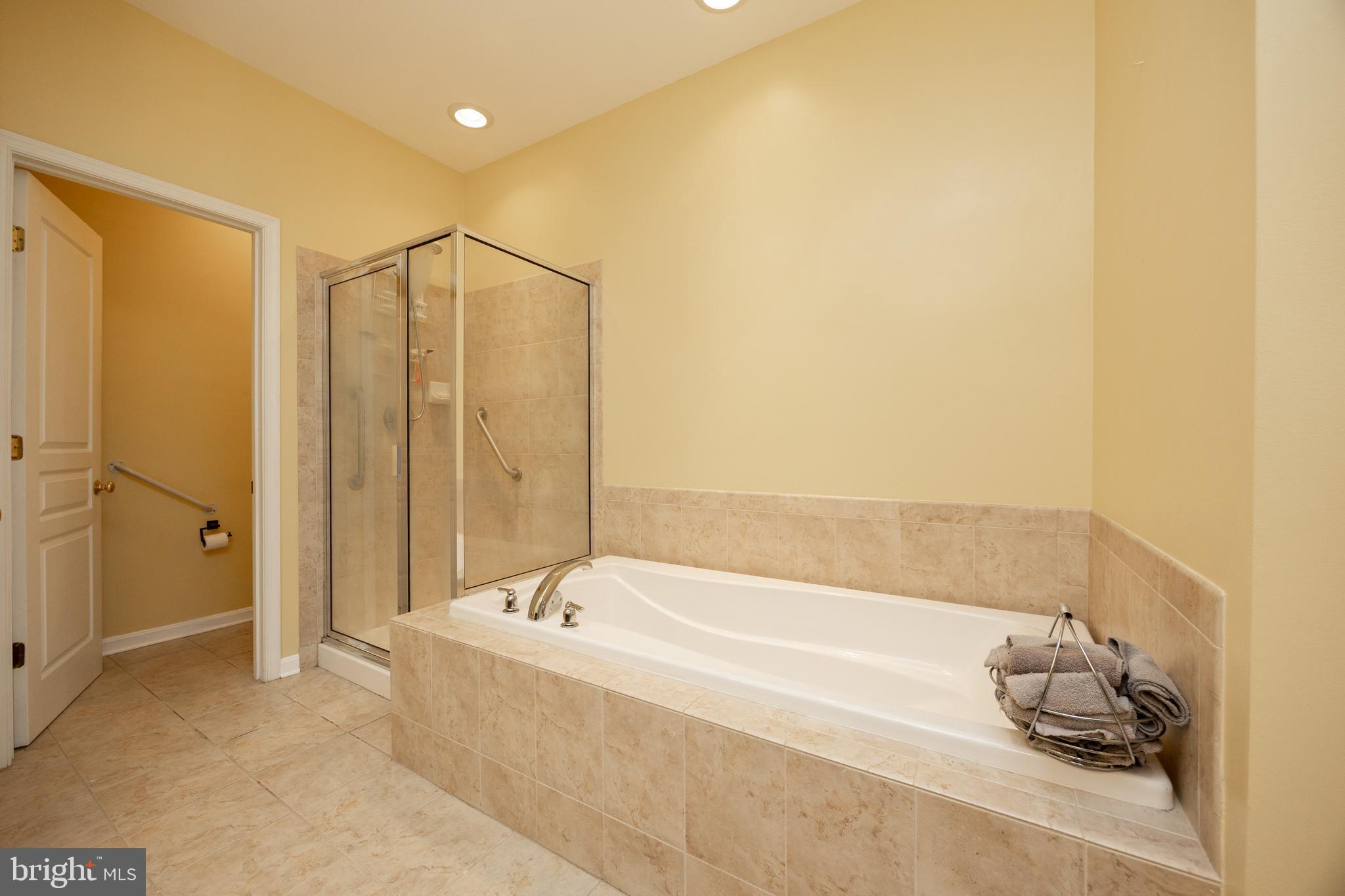 612 Churchill Road Chester Springs, PA 19425 - Photo 15 of 33 a bathroom with a tub and shower