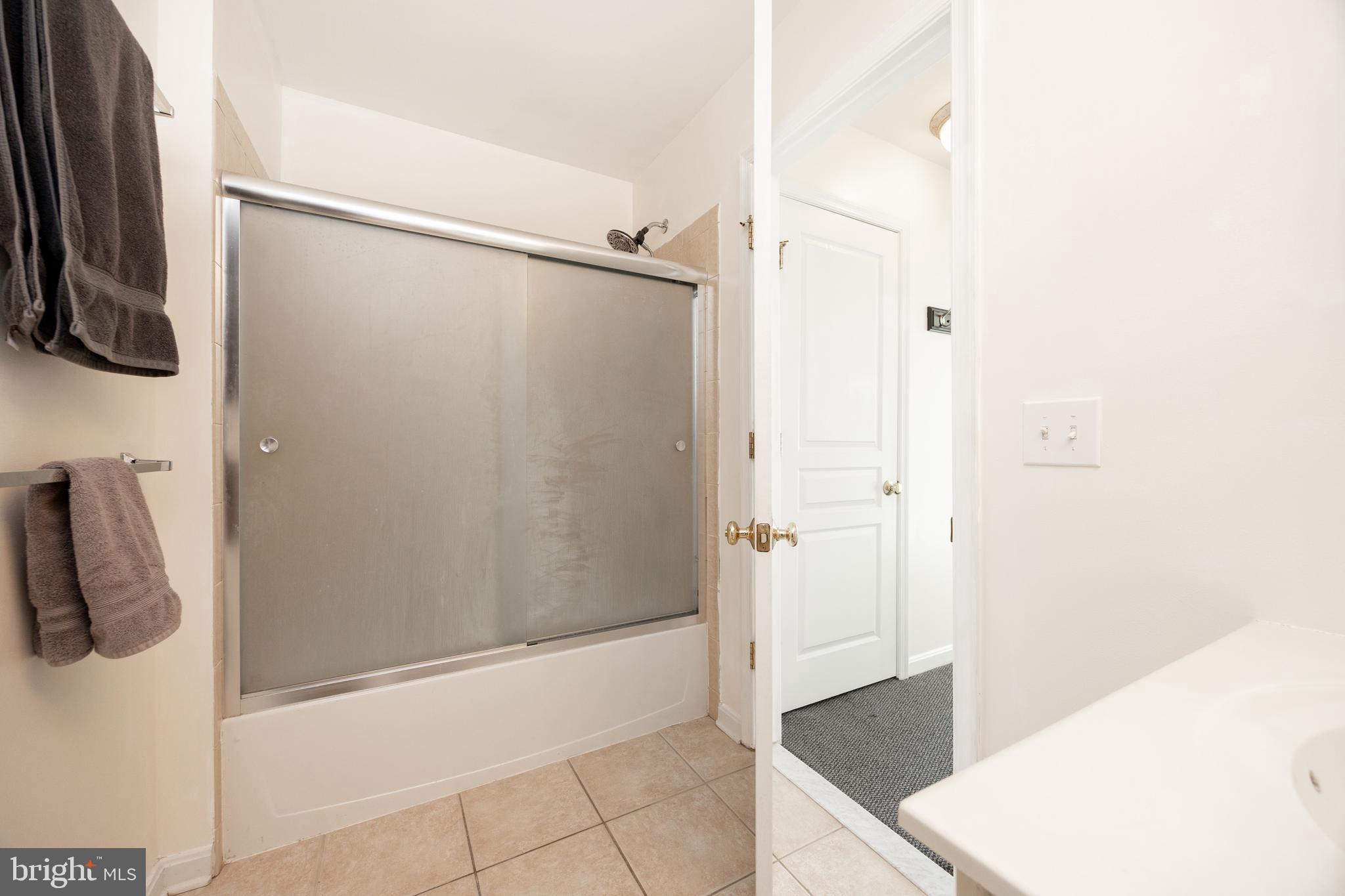 612 Churchill Road Chester Springs, PA 19425 - Photo 26 of 33 a bathroom with a shower and a sink
