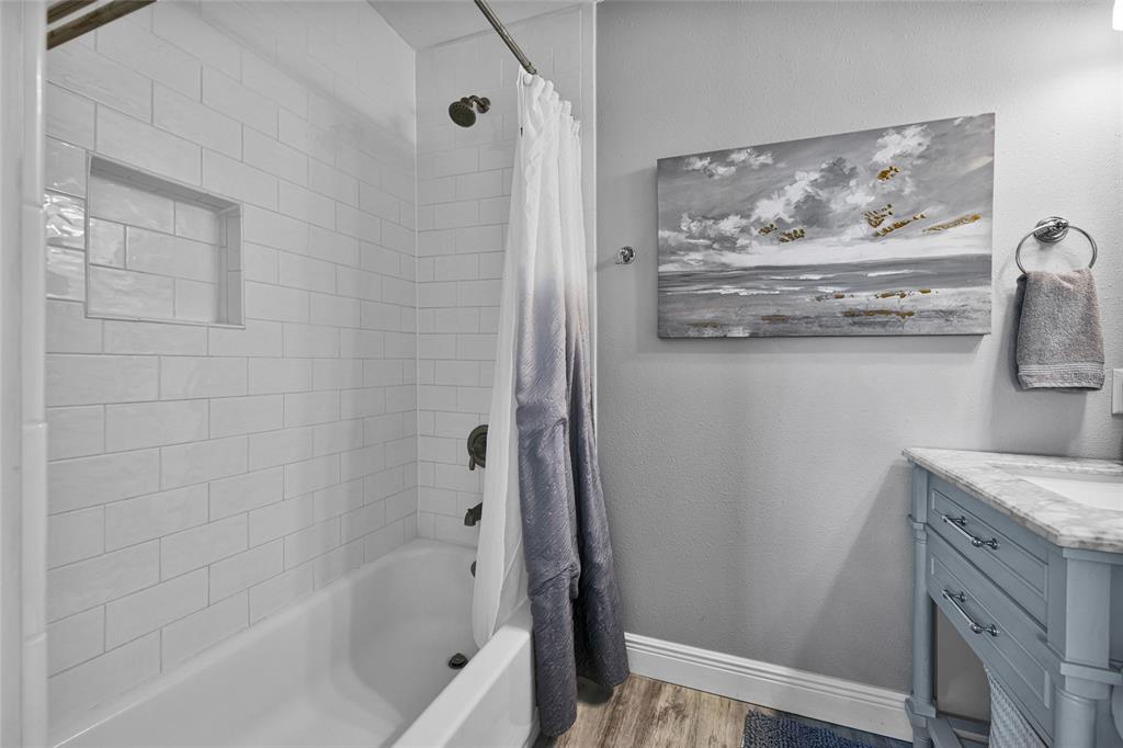 812 Gulf Boulevard, Unit 3 Indian Rocks Beach, FL 33785 - Photo 25 of 62 a bathroom with a bathtub and shower