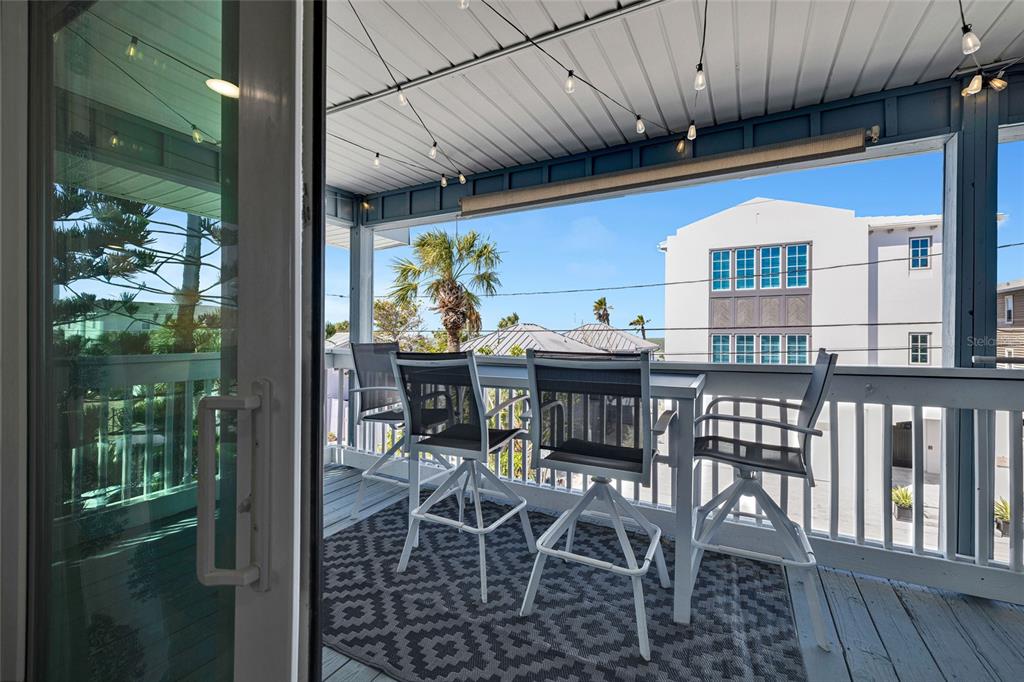 812 Gulf Boulevard, Unit 3 Indian Rocks Beach, FL 33785 - Photo 30 of 62 a view of a dining room with furniture window and outside view