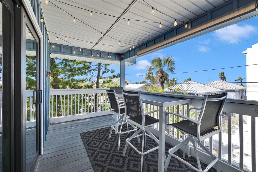 812 Gulf Boulevard, Unit 3 Indian Rocks Beach, FL 33785 - Photo 32 of 62 a view of a dining room with furniture window and outside view